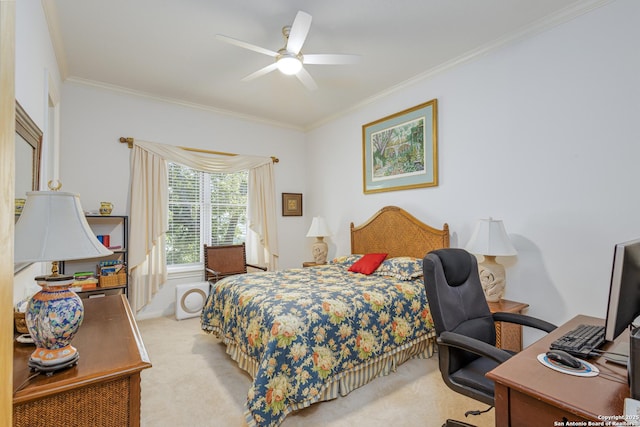 bedroom featuring crown molding, ceiling fan, and carpet flooring