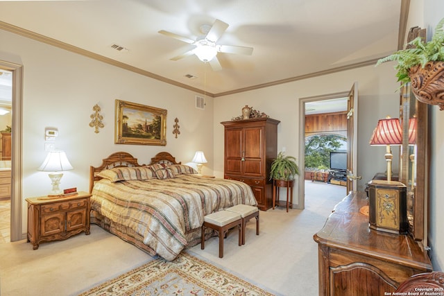 bedroom with ornamental molding, light colored carpet, and visible vents