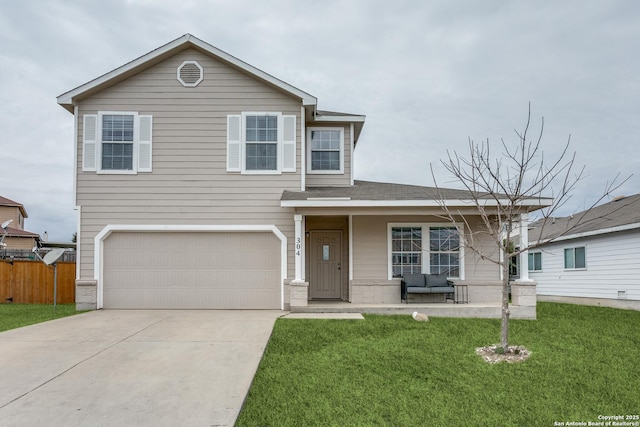 traditional-style home featuring a porch, concrete driveway, a front yard, fence, and a garage