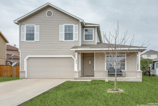 traditional-style house with a porch, an attached garage, fence, driveway, and a front lawn