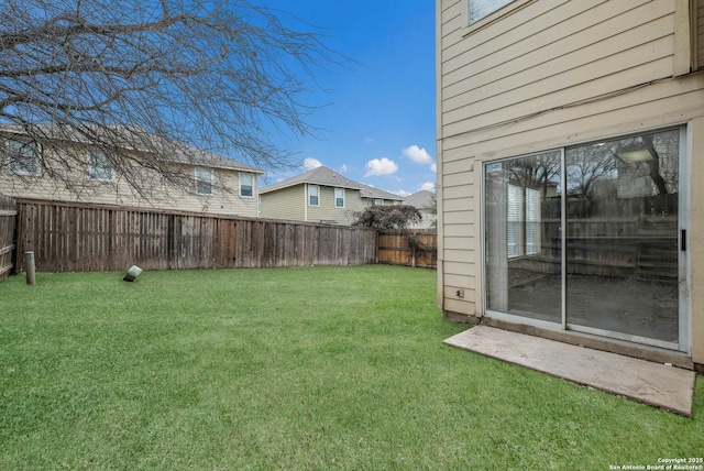 view of yard featuring a fenced backyard