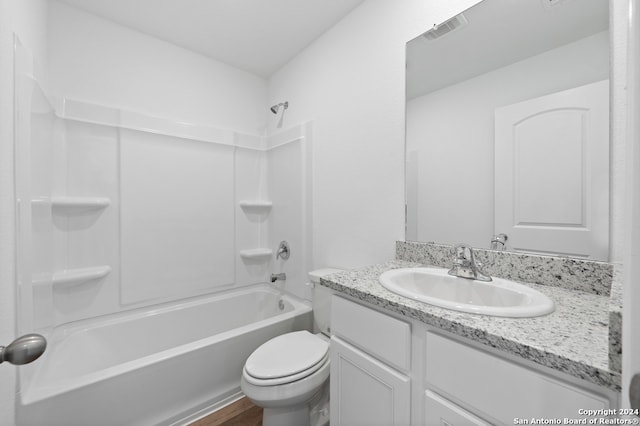 bathroom with toilet, shower / bath combination, vanity, and visible vents