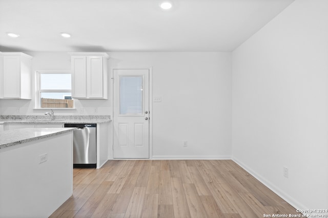 kitchen with recessed lighting, white cabinetry, light stone countertops, dishwasher, and light wood finished floors