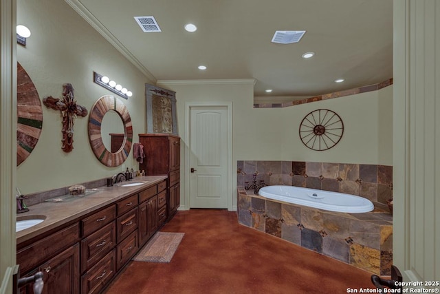 full bath featuring a bath, a sink, visible vents, and crown molding