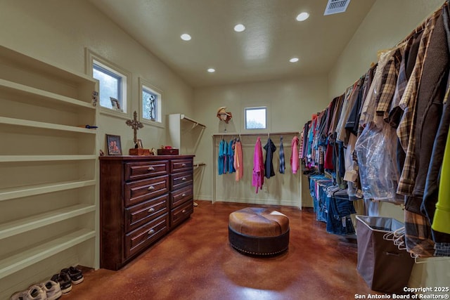 walk in closet with visible vents