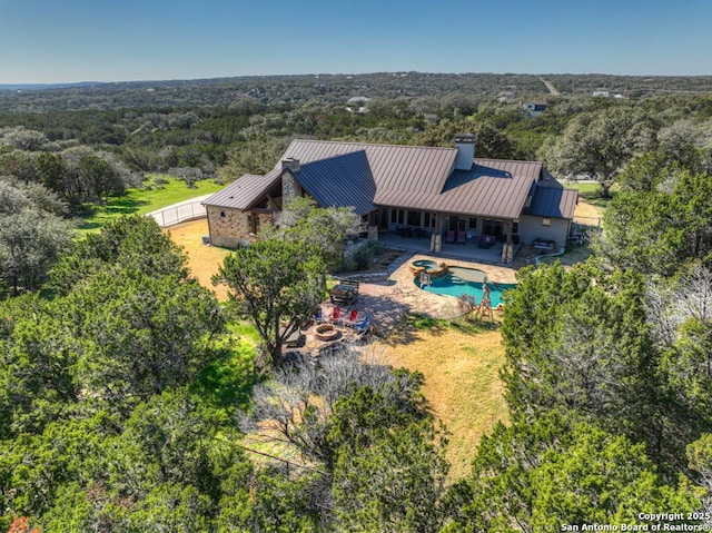 bird's eye view with a forest view