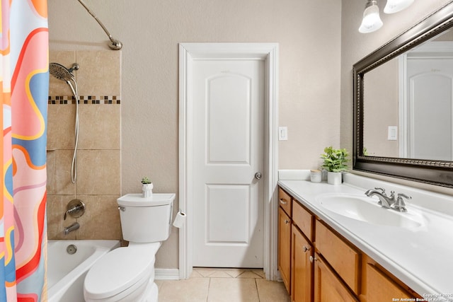 full bathroom featuring toilet, vanity, shower / bath combination with curtain, and tile patterned floors