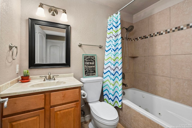 full bathroom with a combined bath / shower with jetted tub, a textured wall, vanity, and toilet