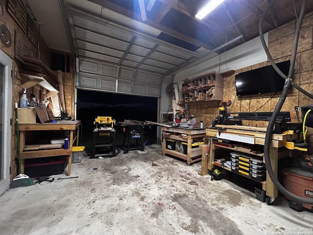 garage featuring a workshop area