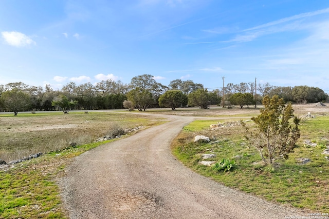 view of road featuring a rural view