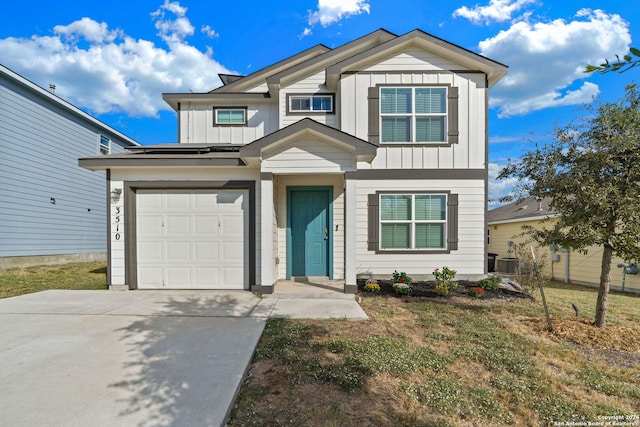 view of front of home featuring driveway, board and batten siding, an attached garage, and central air condition unit