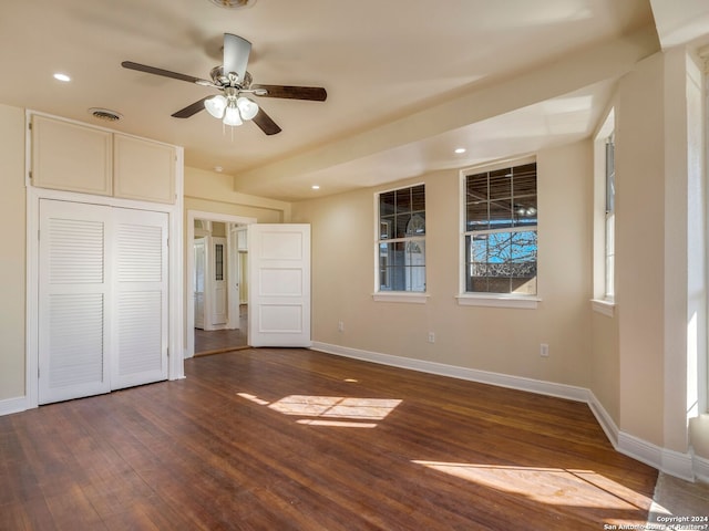 unfurnished bedroom with dark wood-style floors, recessed lighting, visible vents, ceiling fan, and baseboards