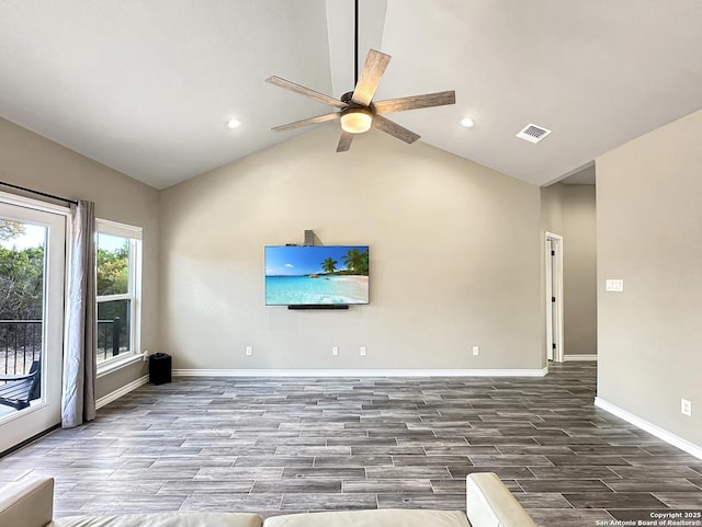 unfurnished living room featuring lofted ceiling, wood finished floors, visible vents, and baseboards