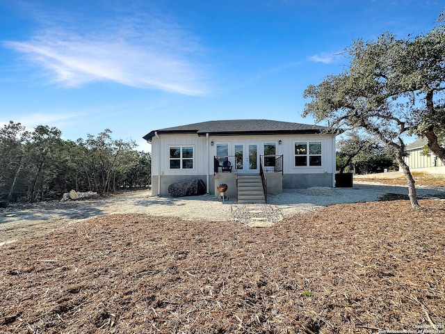 rear view of house with french doors