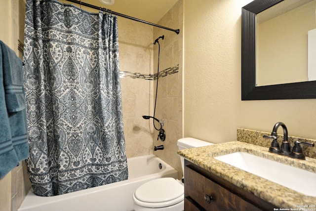 full bath featuring shower / bath combination with curtain, vanity, and toilet