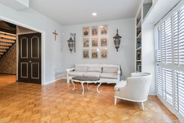 sitting room with recessed lighting and baseboards