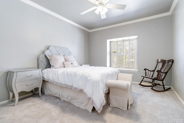 bedroom featuring ornamental molding, light carpet, ceiling fan, and baseboards