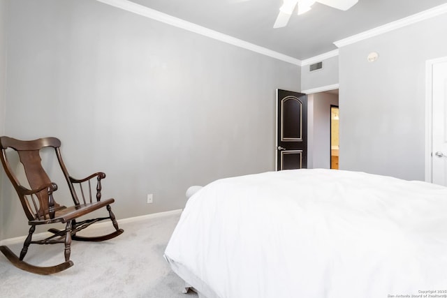 bedroom with baseboards, visible vents, light colored carpet, ceiling fan, and ornamental molding