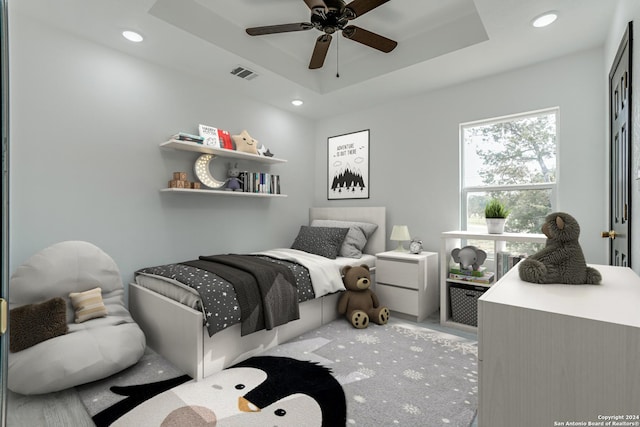 bedroom featuring recessed lighting, a raised ceiling, visible vents, and ceiling fan