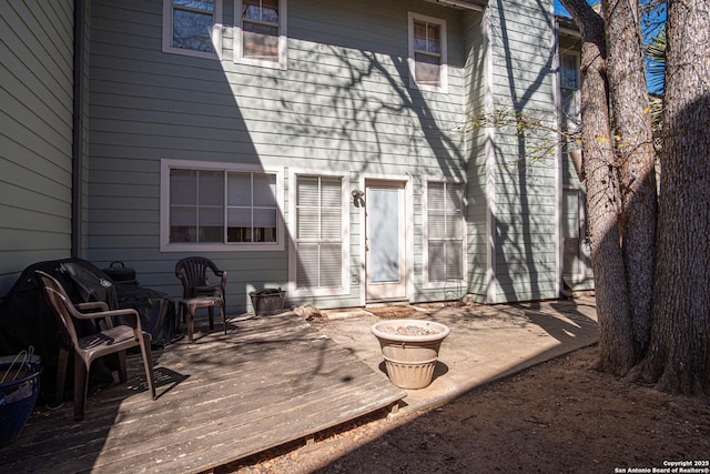 rear view of property with a deck