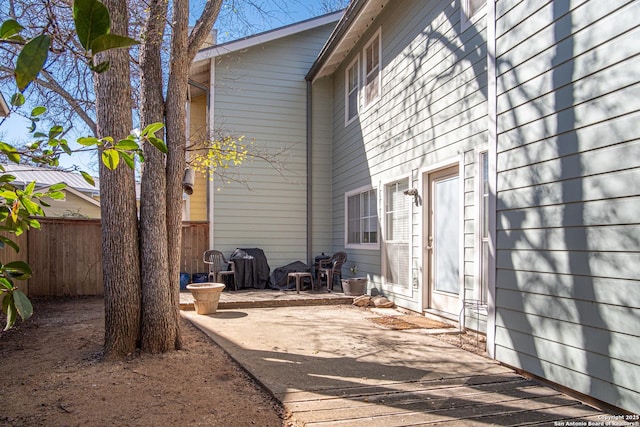 back of house featuring fence and a patio