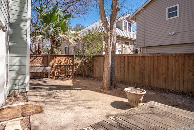 exterior space with a fenced backyard and a patio