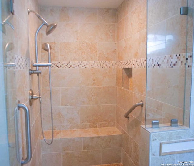 bathroom featuring a stall shower