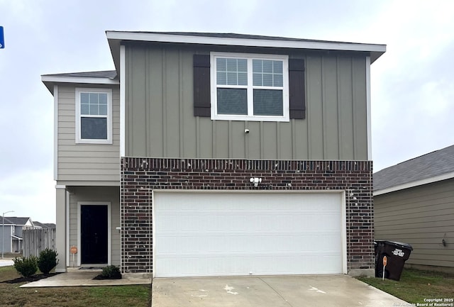 view of front of home featuring an attached garage, brick siding, board and batten siding, and driveway