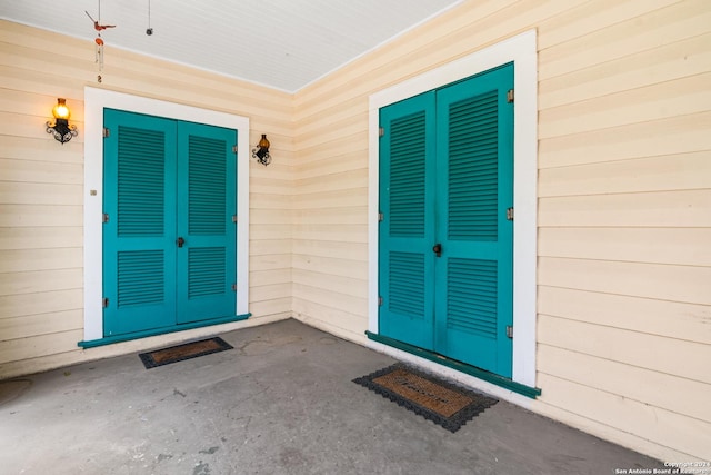 doorway to property featuring french doors