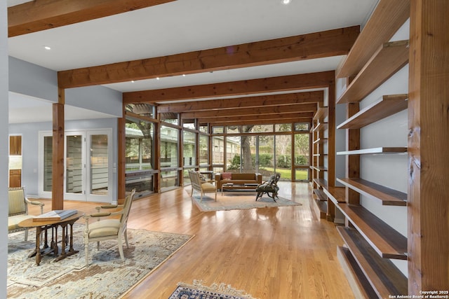 interior space featuring recessed lighting, beam ceiling, and wood finished floors