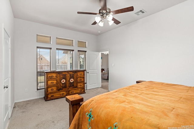 bedroom with a ceiling fan, carpet, and visible vents