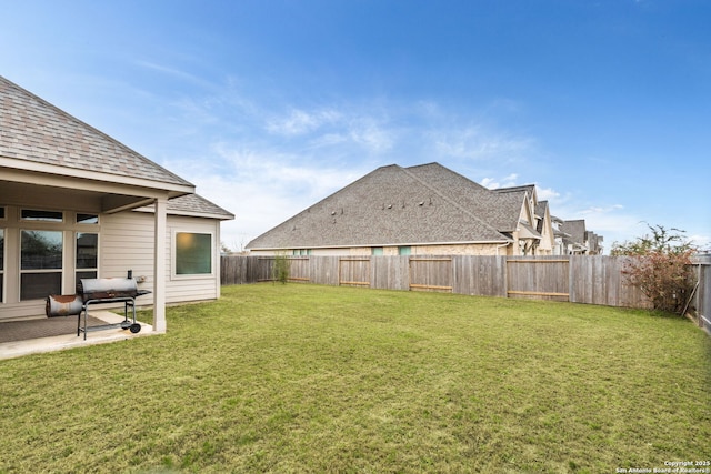 view of yard featuring a fenced backyard