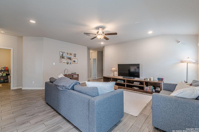 living area featuring ceiling fan, vaulted ceiling, recessed lighting, and wood tiled floor