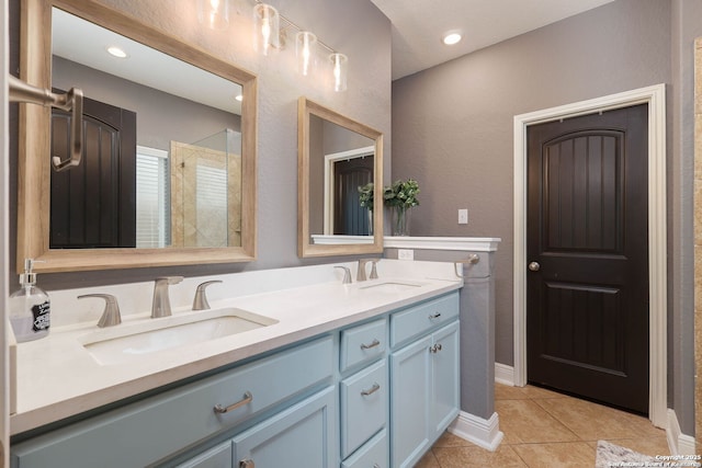 276 Cita Roost, San Antonio, TX 78253 - bathroom with tile patterned flooring, a sink, a tile shower, and double vanity