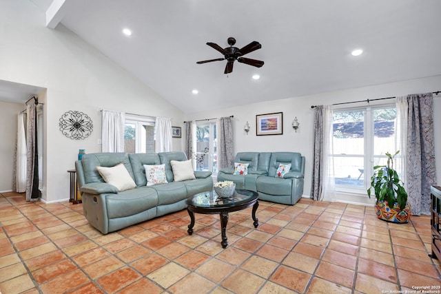 living area featuring high vaulted ceiling, recessed lighting, and a healthy amount of sunlight