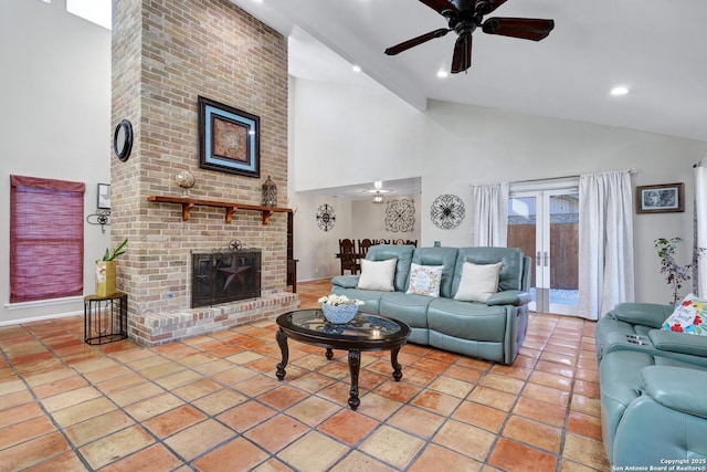 living area with light tile patterned floors, recessed lighting, a brick fireplace, ceiling fan, and high vaulted ceiling