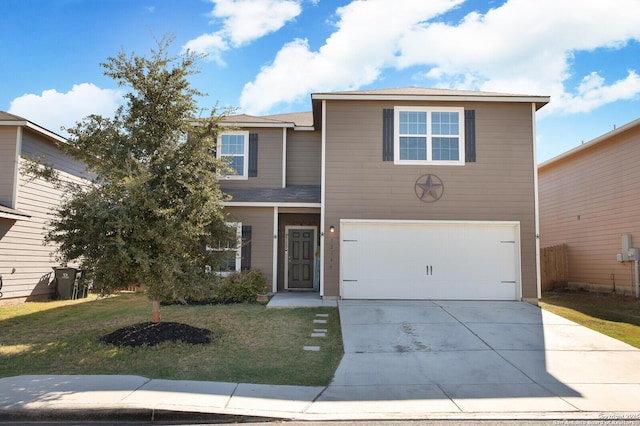 traditional-style home featuring an attached garage, driveway, and a front lawn