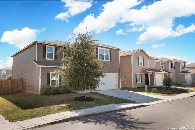 view of front of house featuring concrete driveway, a front yard, fence, a garage, and a residential view