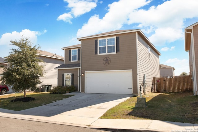 traditional home with an attached garage, fence, a front lawn, and concrete driveway