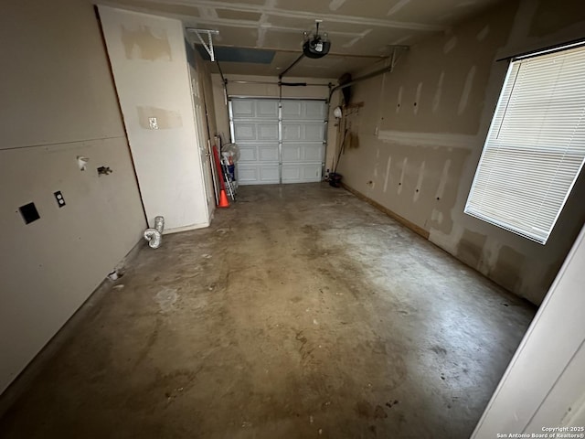 garage featuring a garage door opener