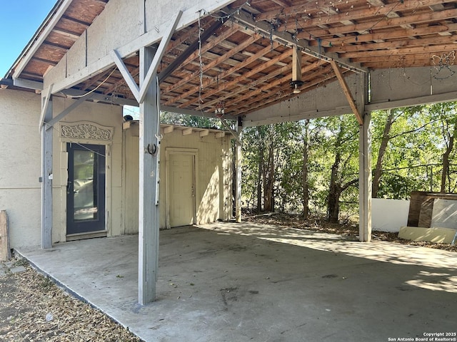 exterior space featuring a carport