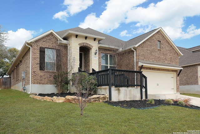 ranch-style home with an attached garage, brick siding, driveway, roof with shingles, and a front yard