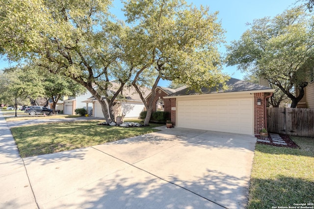 view of front of home featuring an attached garage, brick siding, fence, concrete driveway, and a front yard