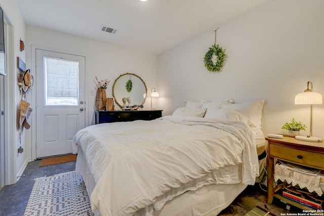 bedroom featuring visible vents