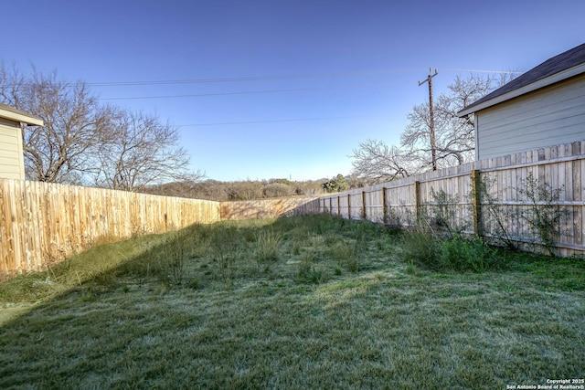 view of yard featuring fence