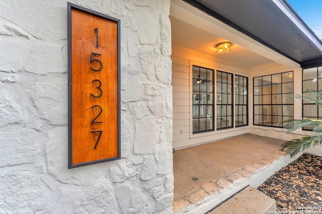 property entrance featuring stucco siding