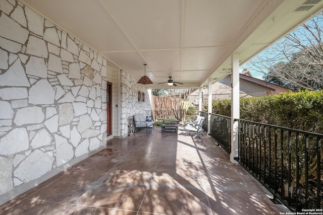 view of patio with visible vents