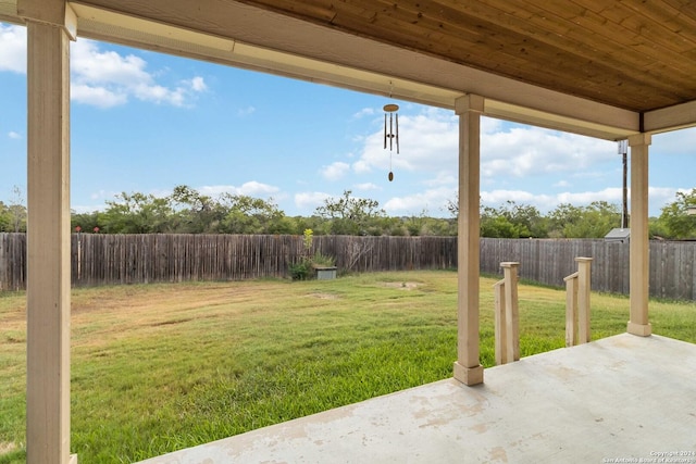 view of yard with a patio area and a fenced backyard