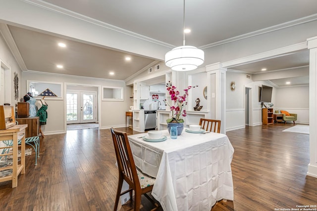 dining area with dark wood-style floors, french doors, visible vents, and crown molding