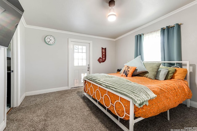 carpeted bedroom with ornamental molding, multiple windows, and baseboards